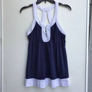 Nicolette blue summer blouse with thick white embroidered trim.  Medium.…​​​​​